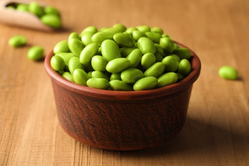 edamame beans in wooden bowl